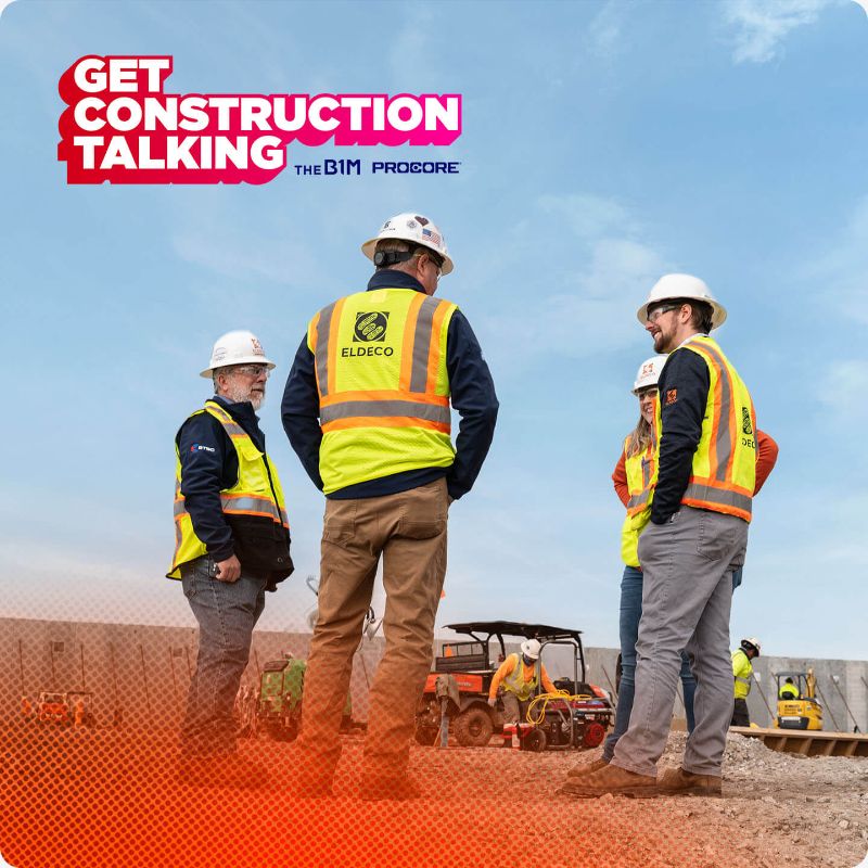 Contractors having a conversation on a construction site